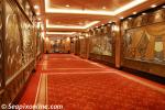 ID 3772 QUEEN MARY 2 (2003/148528grt/IMO 9241061) - Ornate murals decorate the walls of this corridor on Deck 3. In the far distance is a mural of Cunards' founder Samuel Cunard. From her it is possible to...
